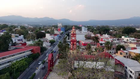parroquia de tlaltenango, a historic church with a red clock tower, aerial view