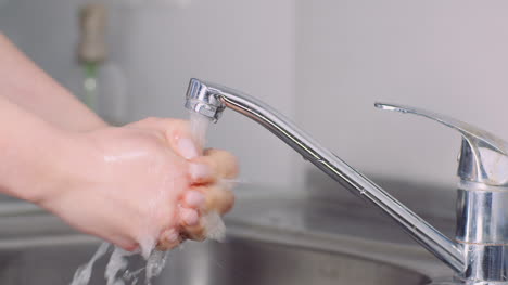 Man-Washing-Hands-In-Sink-Covid-19-1