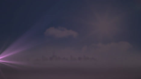 animation of light trails over cityscape and sky