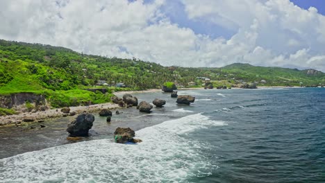 dynamic low angle aerial of soup bowl beach