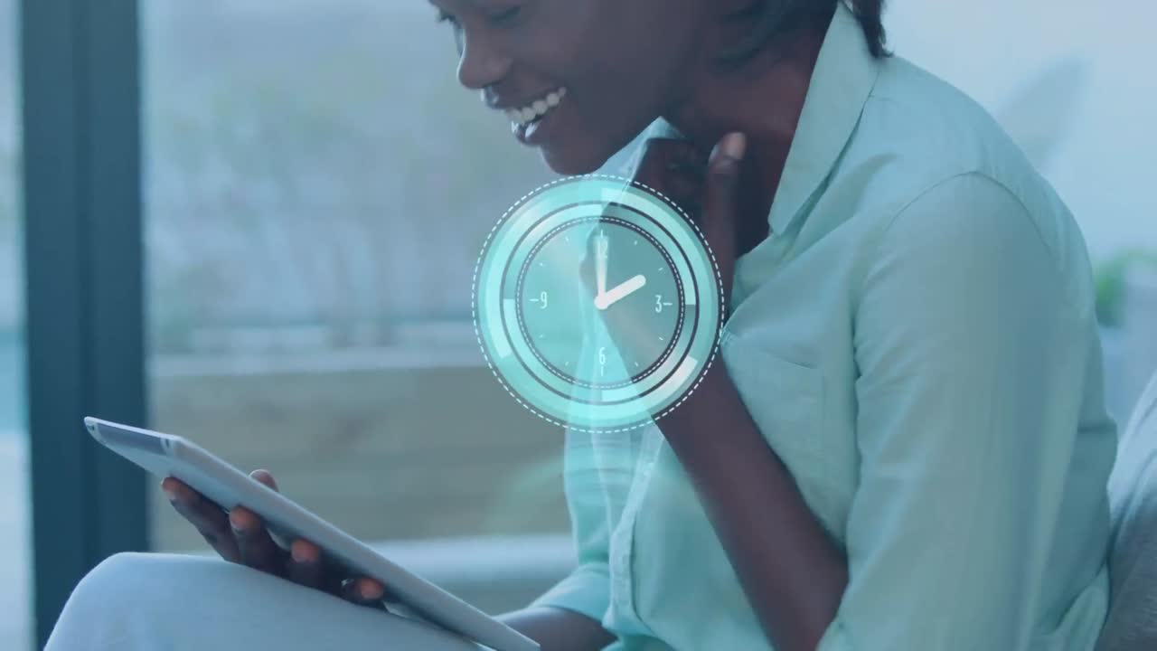 Animation of scope scanning and clock over african american businesswoman using tablet