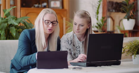 Female-Colleagues-Discussing-Business-Strategy-4