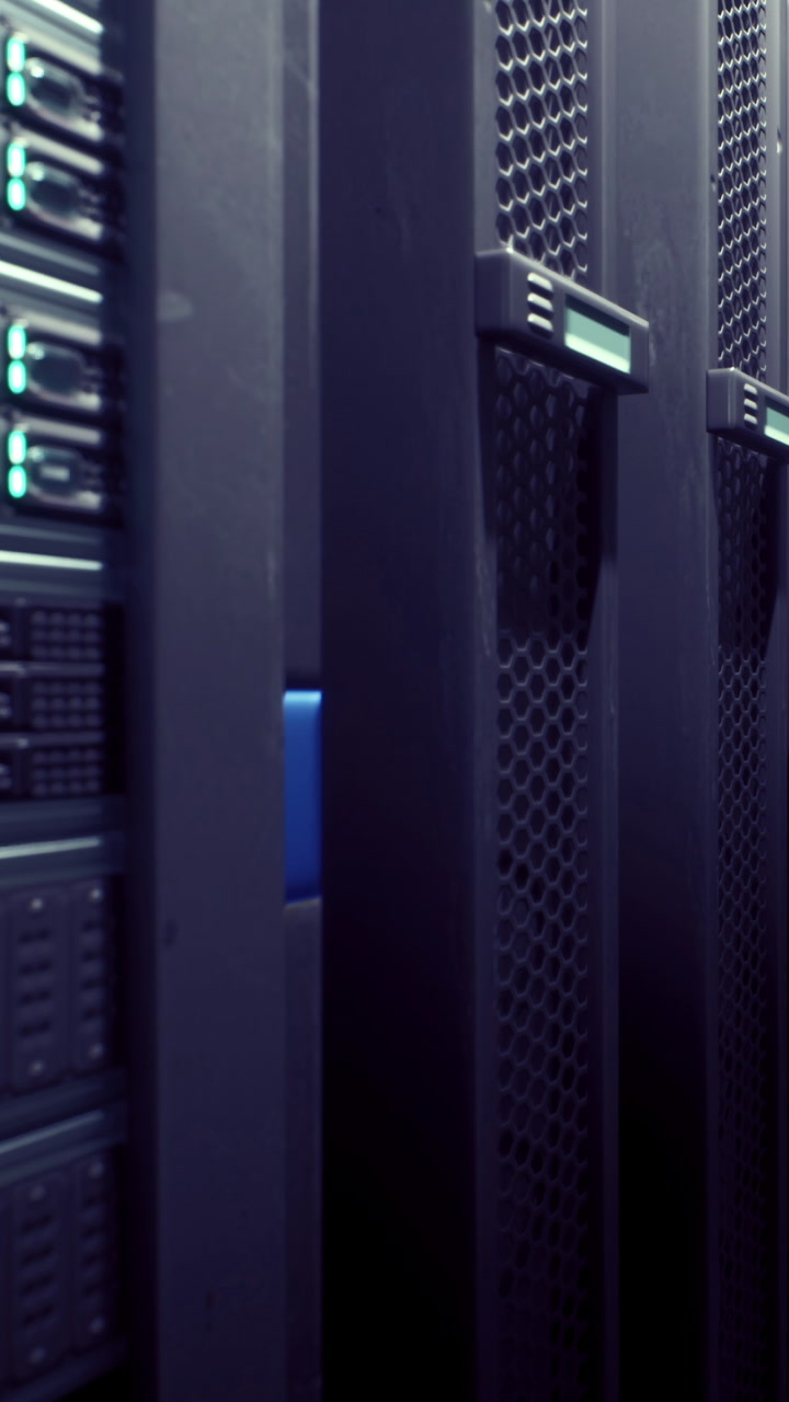 Server racks in a data center during night working hours with lights on