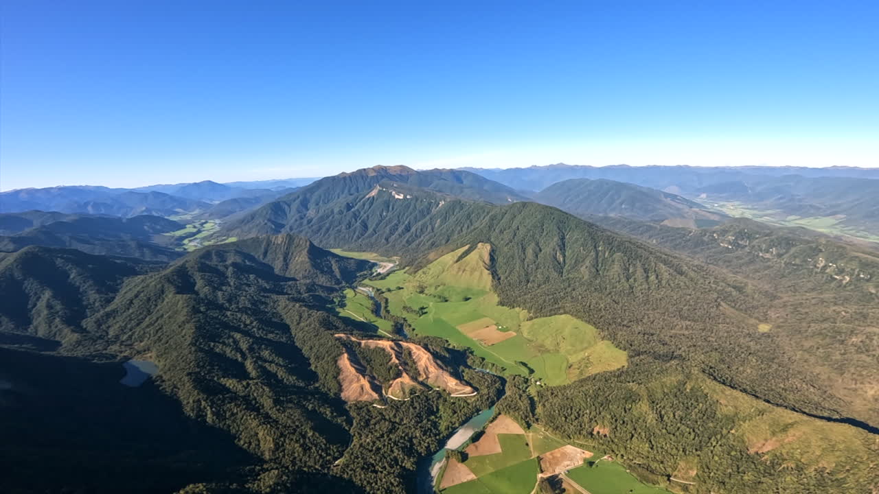 Aerial POV Shot from a Helicopter Flying Over the foothills of the Southern Alps, New Zealand