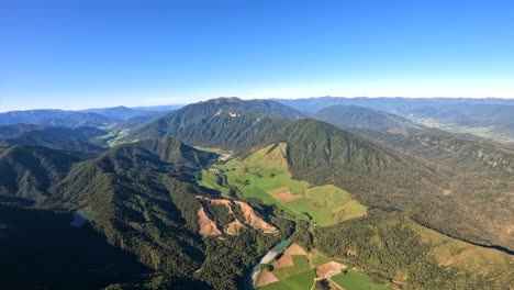 aerial pov shot from a helicopter flying over the foothills of the southern alps, new zealand