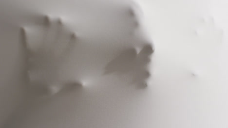 video of shapes of hands and head moving on white background