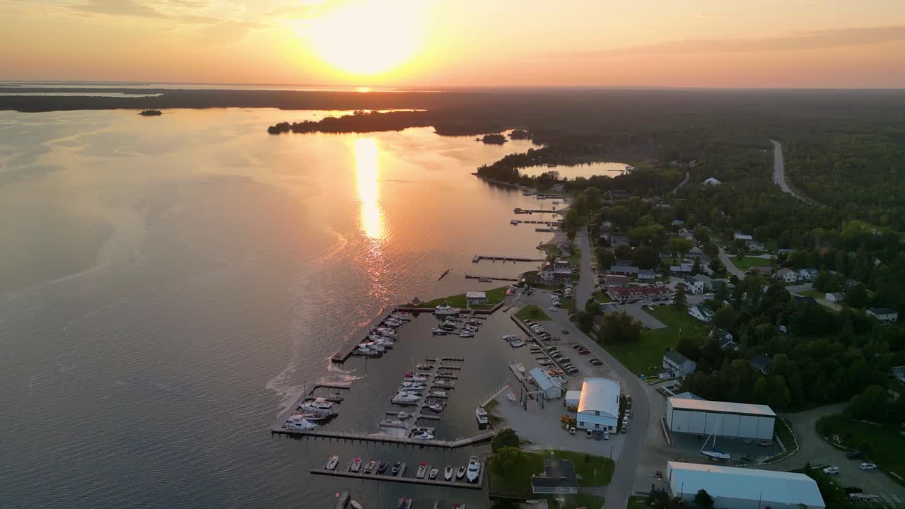 Aerial view of sunset with Hessel Marina flyover, Lake Huron, Michigan