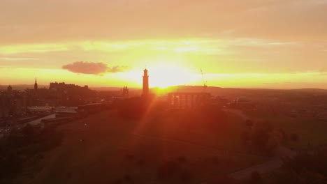 Aerial view of beautiful Edinburgh Scotland during dramatic sunset- Drone view from Calton Hill