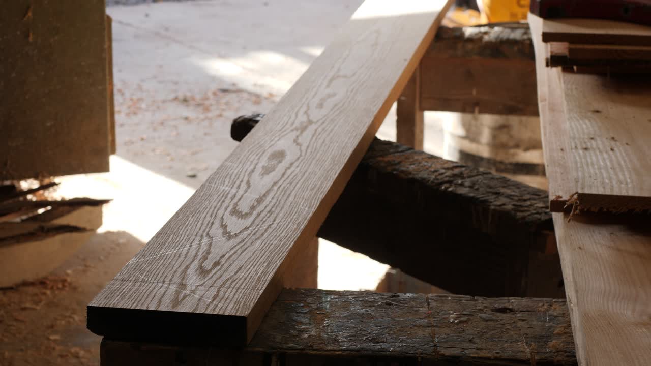 White oak timber plank in a traditional shipbuilding workshop