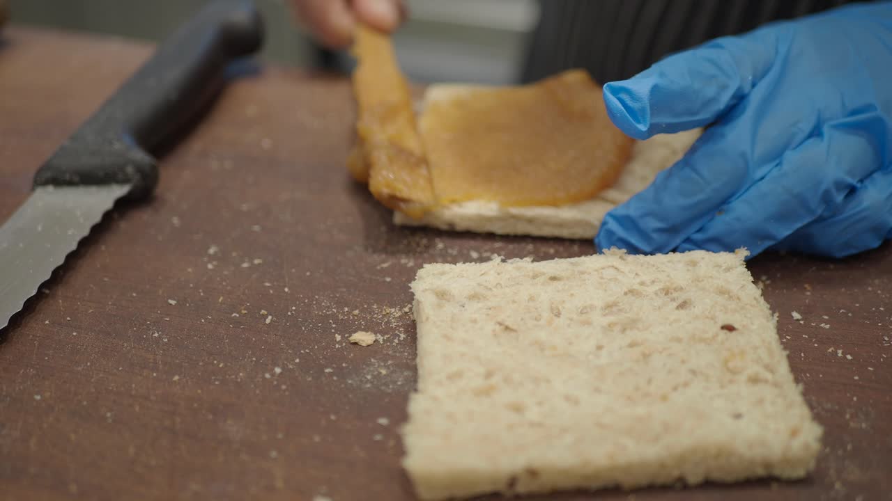 Making a Fruit Spread Sandwich