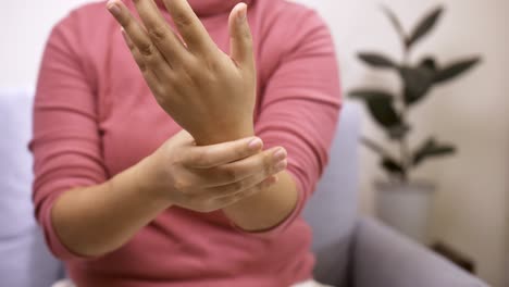 women doing hands stretching after intense home office day protect office syndrome