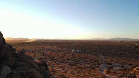 Reveal-of-a-building-in-a-desert-landscape