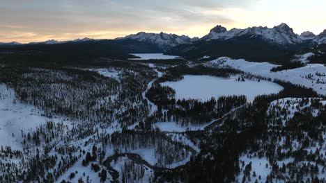 vista of snow landscape with forest and mountain range near sun valley, idaho