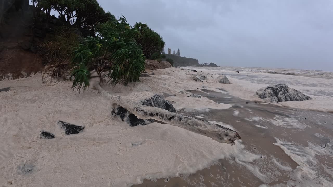 Ocean Foam At Duranbah Beach During Cyclone Alfred In NSW, Australia - Wide Shot