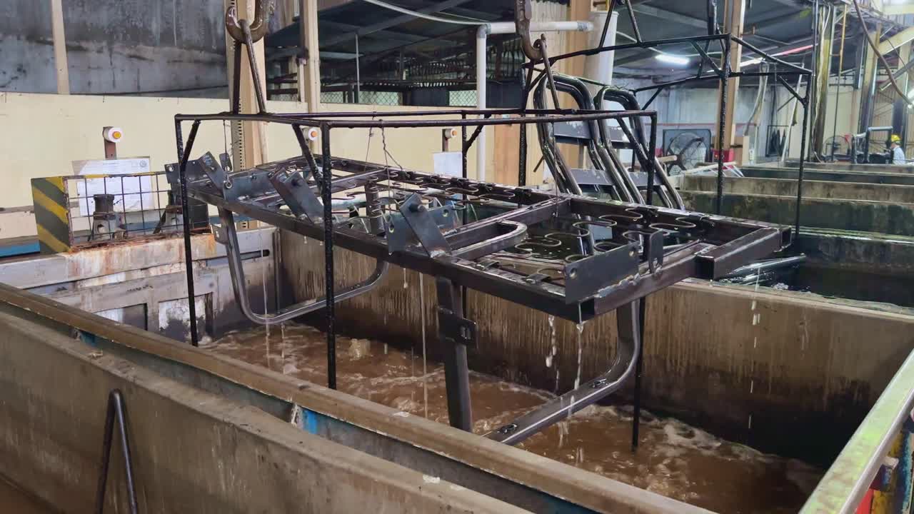 Industrial Metal Parts Cleaning and Finishing Process in a Factory