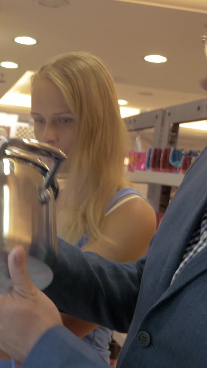 Couple Shopping for Kitchenware in a Home Goods Store