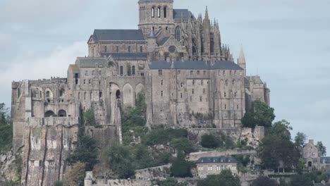 Close-up-over-architecture,-buildings-and-church-with-monastery-on-an-island-Mont-Saint-Michel,-Normandy,-France