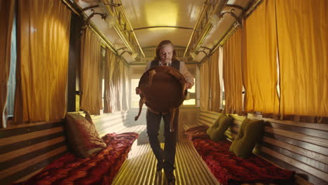 a man in a vintage train car