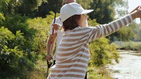 padre e hija pescando