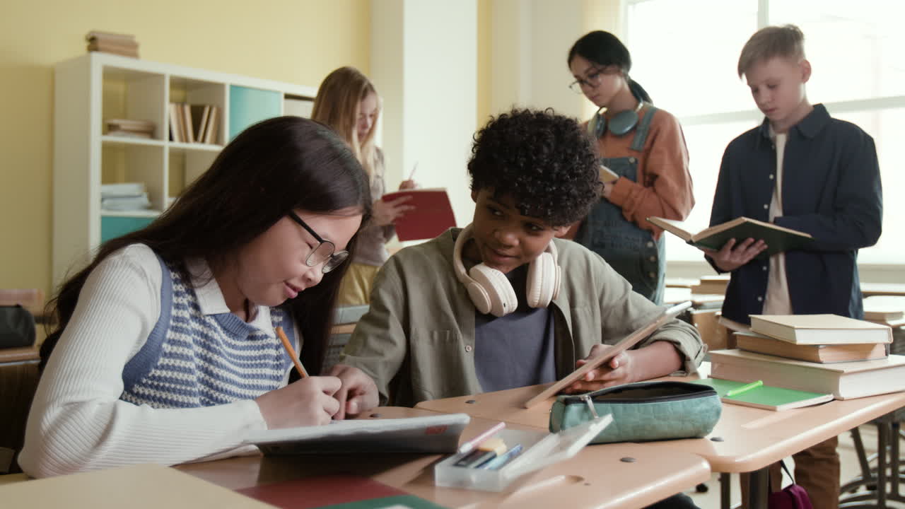 Students studying and collaborating in a classroom