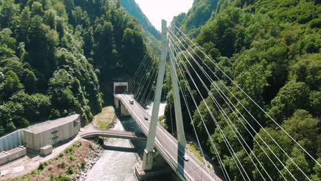 cable-stayed bridge over a mountain river