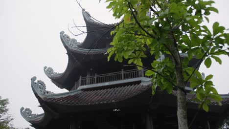 ancient temple tower roof exterior at spiritual complex in trang an, bai dinh pagoda, ninh bình province, vietnam