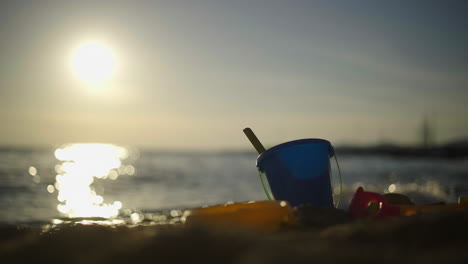 sunset beach scene with toys