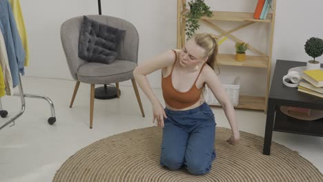 woman stretching at home