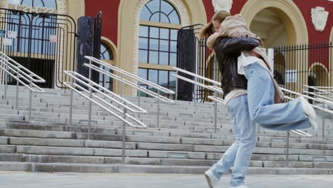 couple hugging on steps