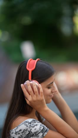 woman listening to music outdoors