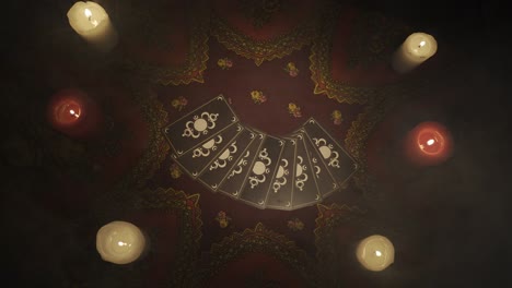 tarot cards and candles in a dark spiritual setting
