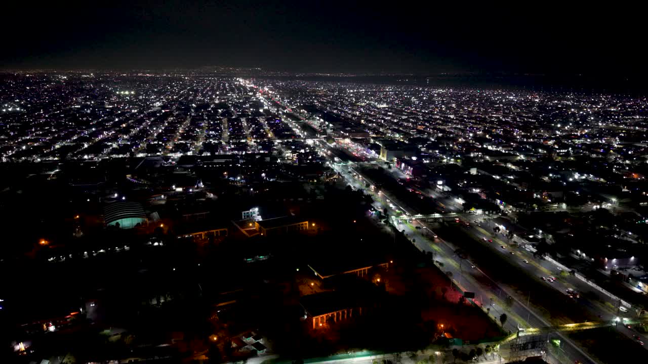 Nighttime aerial drone shots showing life unfolding in Ecatepec