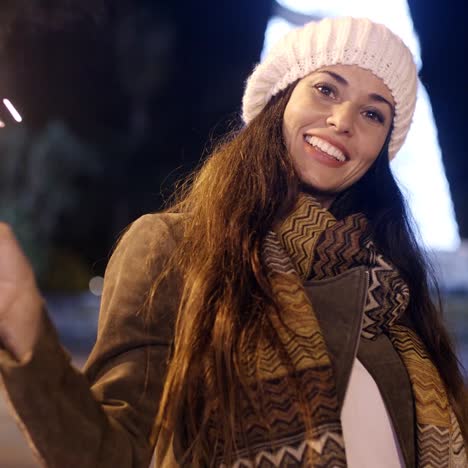 vivacious young woman celebrating christmas