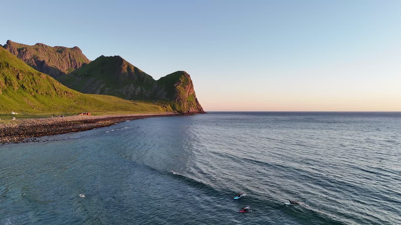 Aerial footage of Unstad, a remote surfing paradise in northern Norway’s Lofoten Islands. Nestled between high mountains and featuring pristine white sand beaches, far above the Arctic Circle