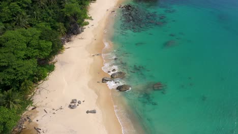 aerial tilt reveal of laem singh beach in phuket, thailand