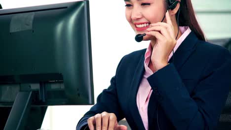 Business-people-wearing-headset-working-in-office