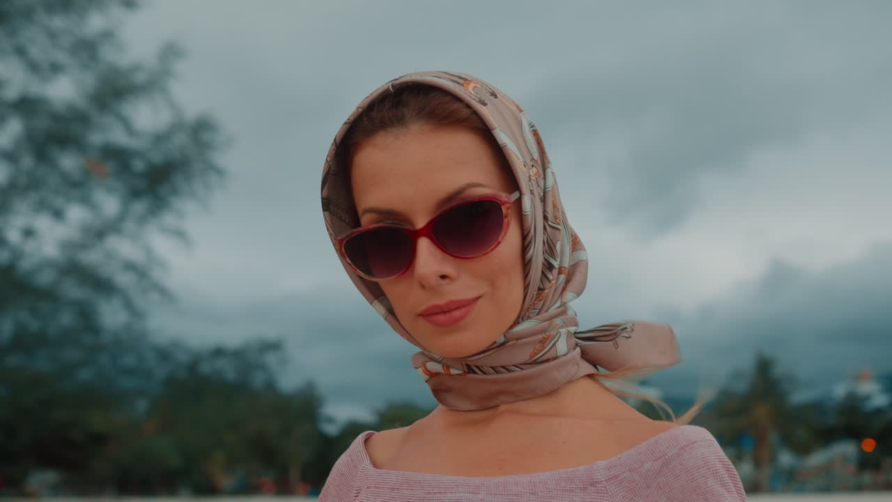 Woman in Headscarf and Sunglasses Outdoors