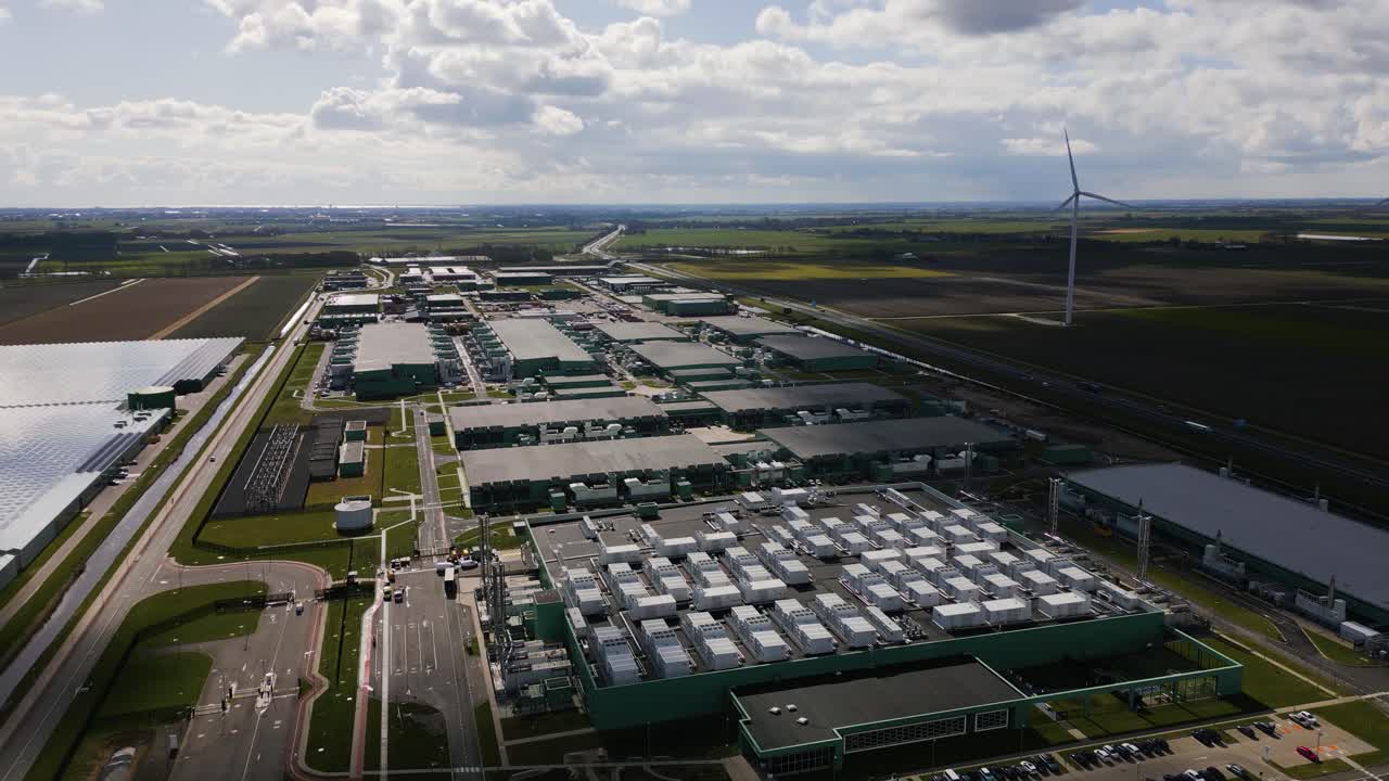 Drone footage showing the scale and symmetry of a massive data center and energy facility in Middenmeer, the Netherlands