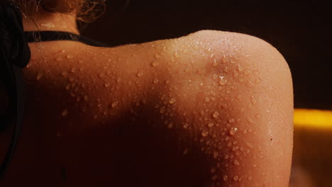 woman's wet shoulder