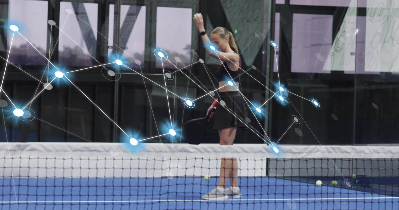Woman gripping ball, activating overlay and serving on padel court showcasing sports technology