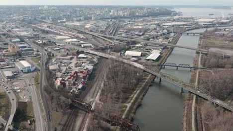 Aerial-View-Of-Bridges-Spanning-Across-Puyallup-River-At-The-Port-Of-Tacoma-In-Washington---drone-shot