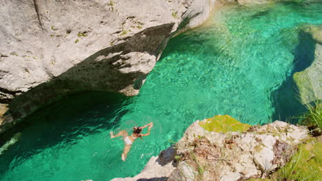 Island,-woman-swimming-and-tropical-view