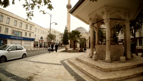 spetial source of water befor mosque on modern street ancient city sanliurfa cloudy wintry day