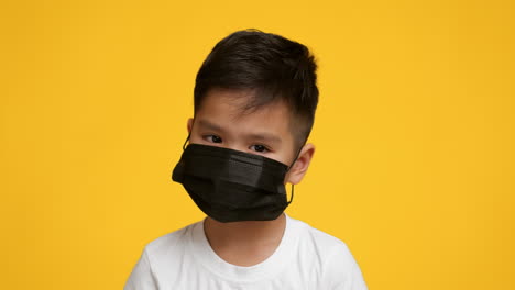 child wearing a mask