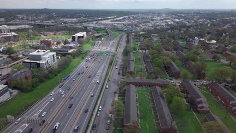 aerial flyover over interstate-40, also know as the music highway, in nashville, tennessee in daytime with light traffic