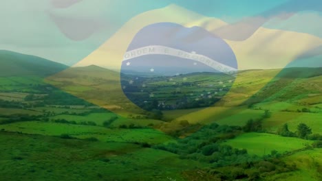 animation of flag of brazil blowing over seascape