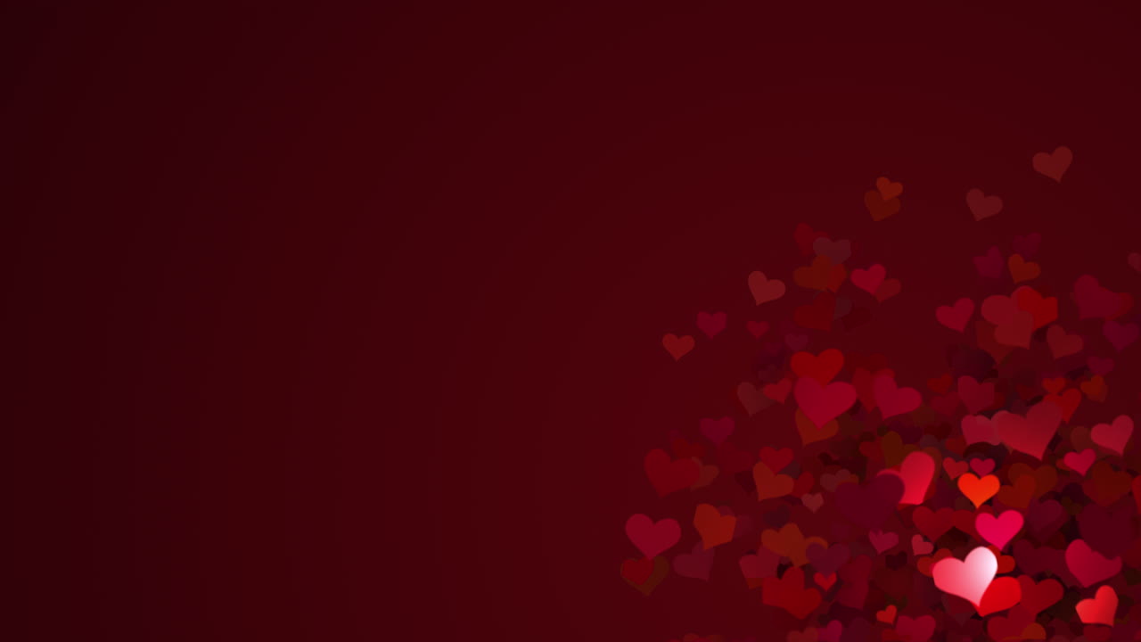 Small red heart symbols appear in the bottom corner. Dark animated romantic background for valentines day.