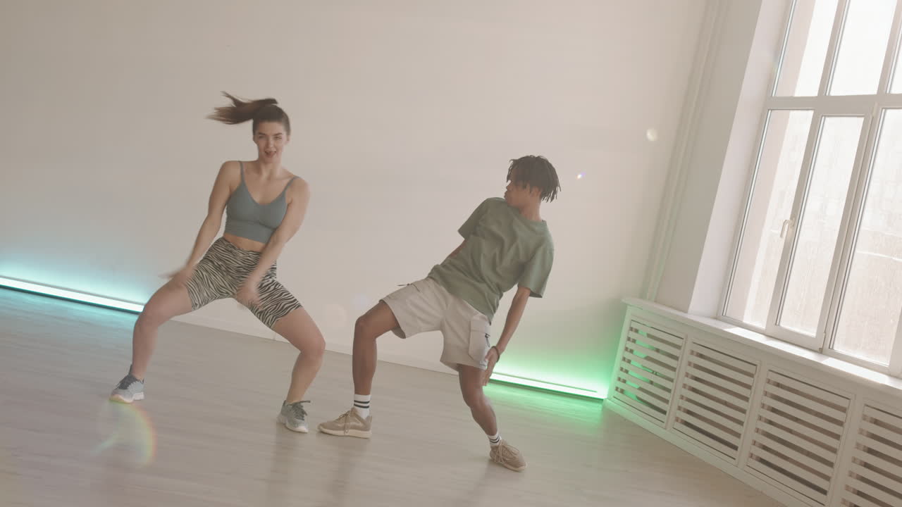 Two Young Modern Dancers in Studio