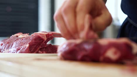 Large-rack-of-lamb-being-trimmed-for-fine-dining-meals