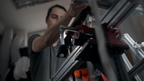 technician calibrating machine components